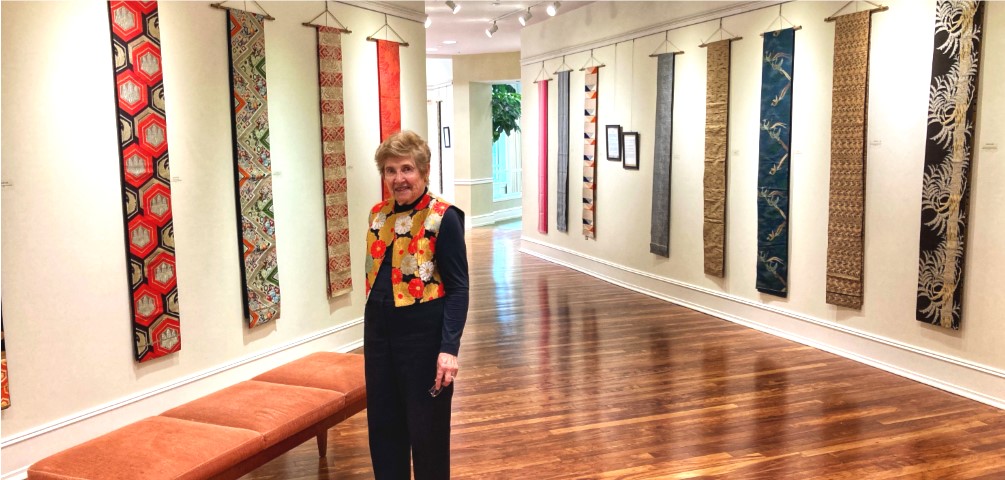 GHBC resident showcases Japanese obi in the GHBC art gallery.
